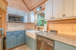 Kitchen Offers Stainless Steel Appliances and a Gas Cooktop